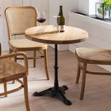 Design Stiltisch & Runder Tisch aus Wildeiche Massivholz und Gusseisen