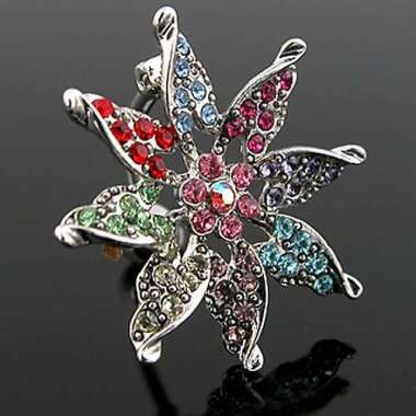 Reverse Bauchnabel Piercing Blume mit mehrfarbigen Kristall-Steinchen.