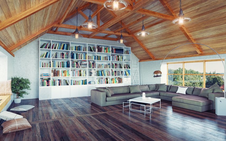 Großes Dachzimmer Idee mit Nutzung als Bibliothek mit Sitzecke & Bogenlampe sowie großer Bücherregalwand aus Holz