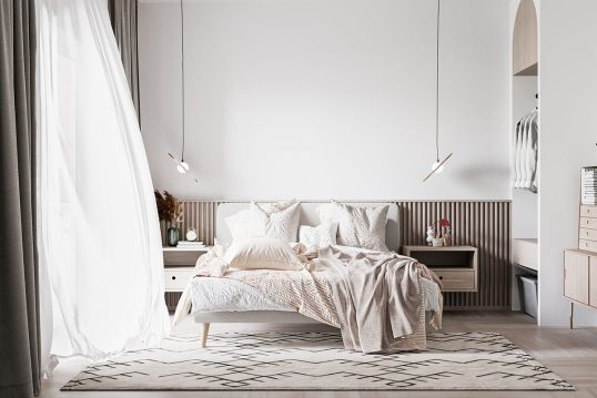 Stilvoll eingerichtetes Schlafzimmer mit Polsterbett & Nachtschränken